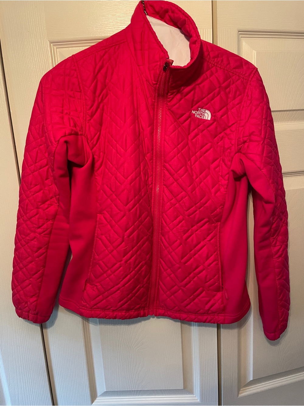 The North Face woman’s Pink Quilted Jacket